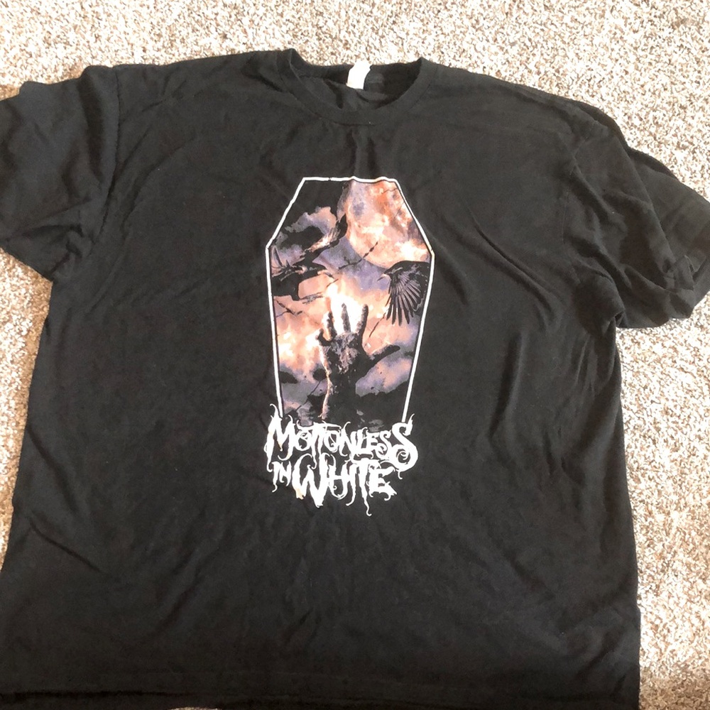 Black Motionless in White T-Shirt
